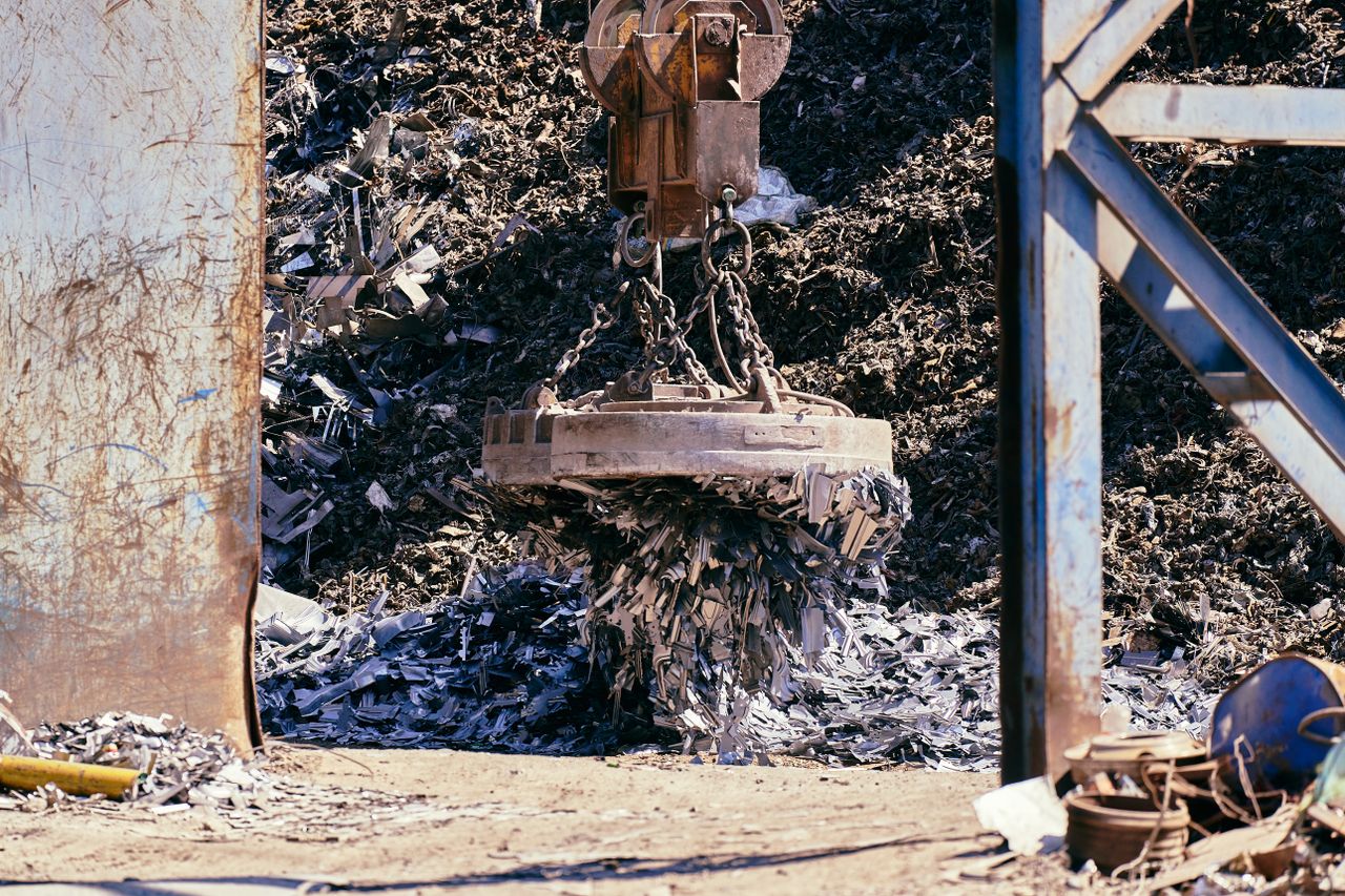 Sorted industrial scrap metal stacked in a yard